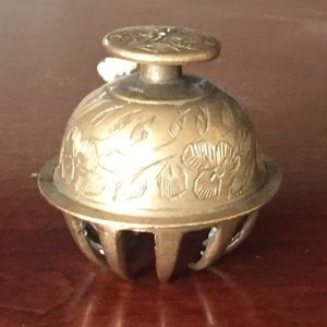 Antique brass carved cow bell